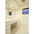 白で統一された洗面脱衣室