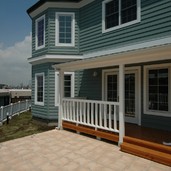 傾いた建物をジャッキアップして地盤改良を施し外張り断熱で外回りも完璧に