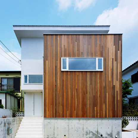 モザイクの様な美しい木目の外壁