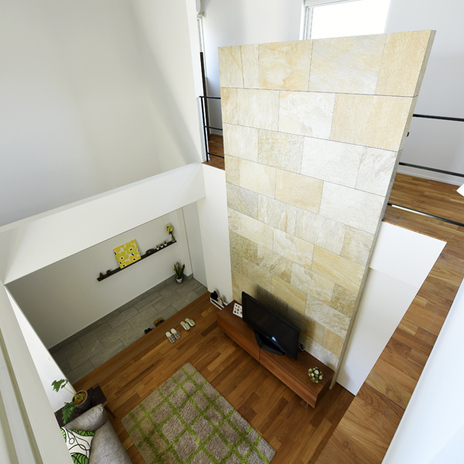 ダイナミックなタイルの壁が印象的！吹き抜けで開放的に