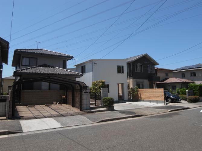 多世帯のコの字の家