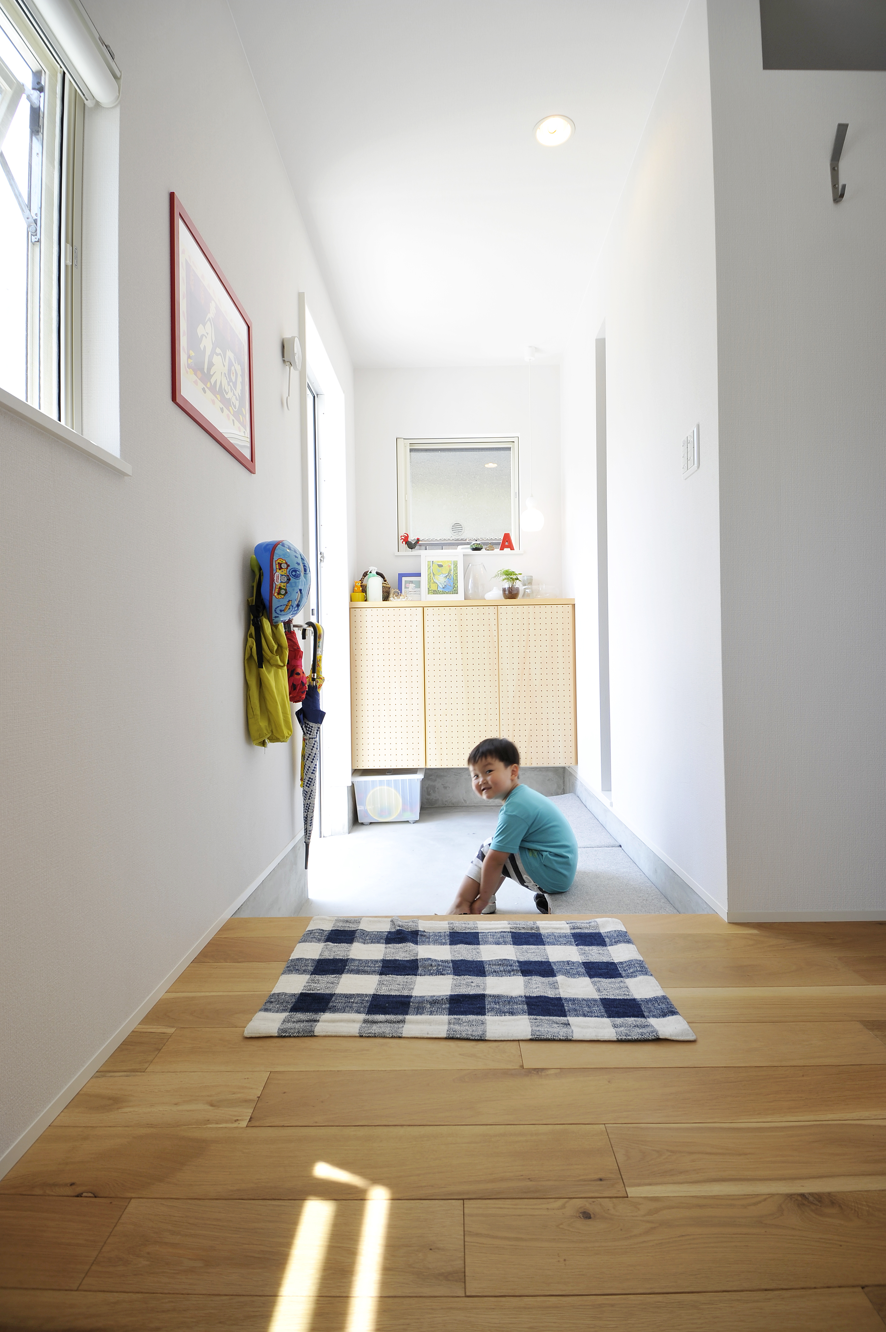 素材感を楽しむ玄関スペース