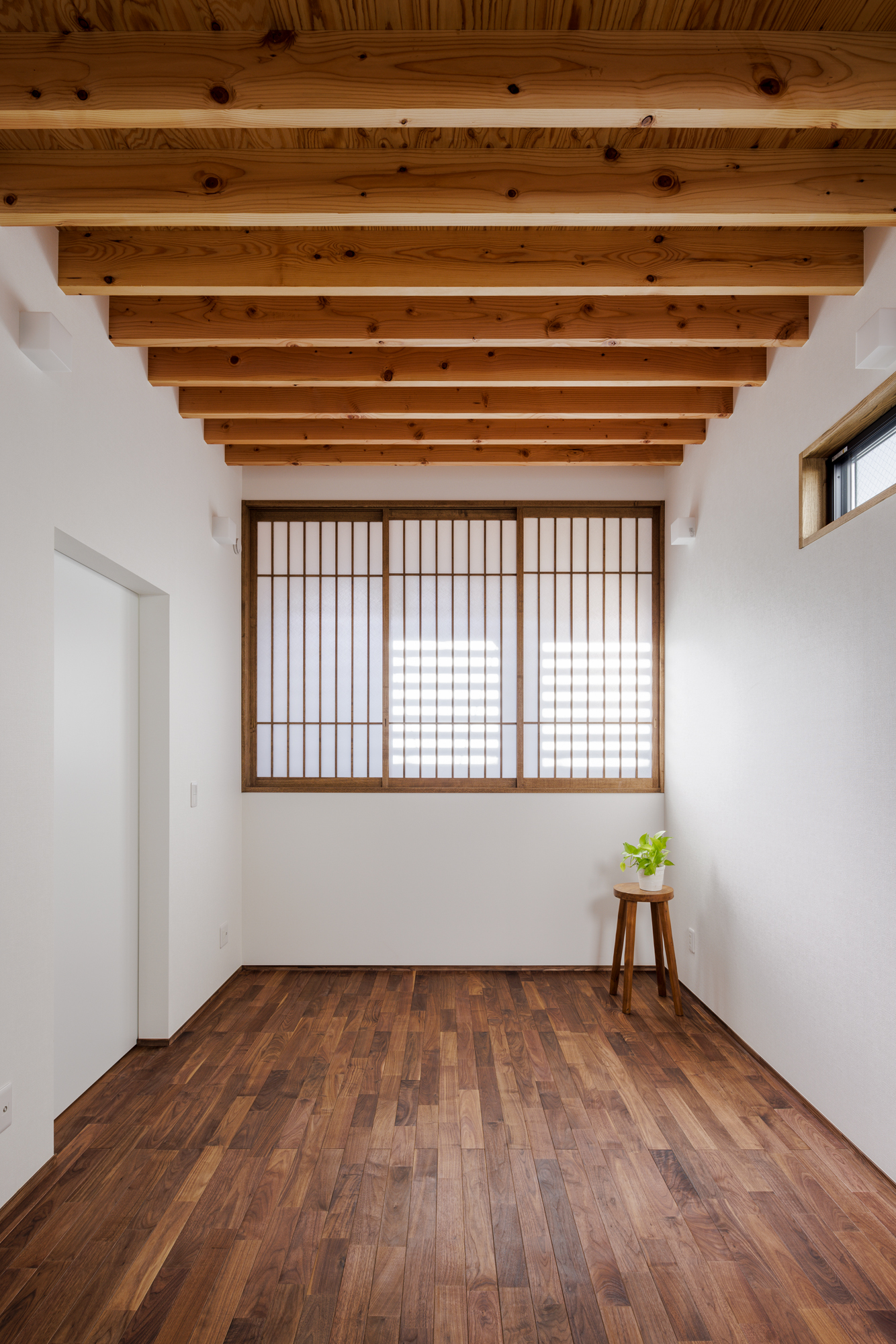 ２階の個室（ベットルーム）「光をつかむ家（light fall house）