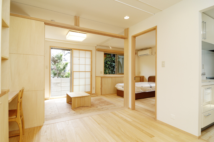 大きな引込戸で広さを生み出しプライバシーも作り出す